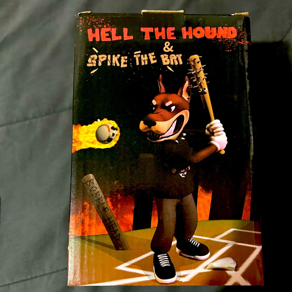Hard Jewelry Hell the hound bobble head, and Spike the bat.
